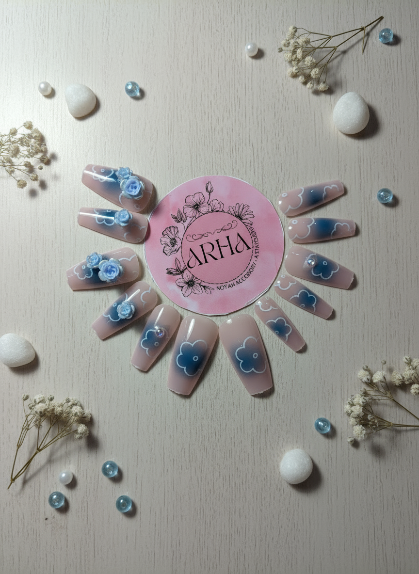 Nail art display with 'ARHA' logo, floral designs, and decorative elements on a light background.