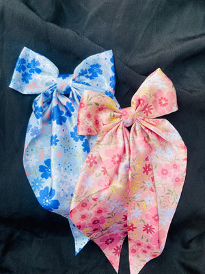 Ocean Bloom aesthetic blue hair bow featuring delicate floral patterns on silky satin, ideal for summer outfits and beach-themed hairstyles."