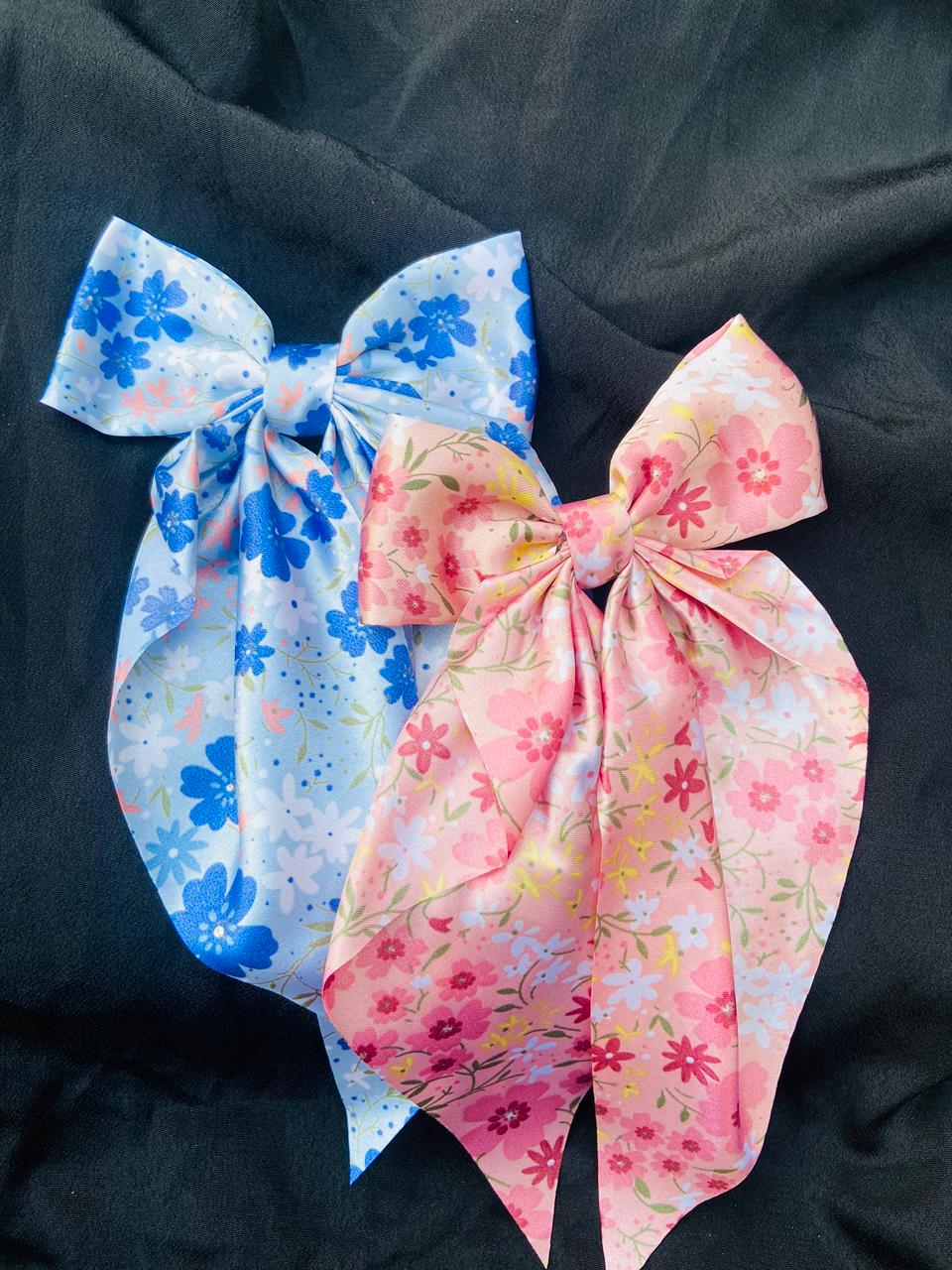 Ocean Bloom aesthetic blue hair bow featuring delicate floral patterns on silky satin, ideal for summer outfits and beach-themed hairstyles."