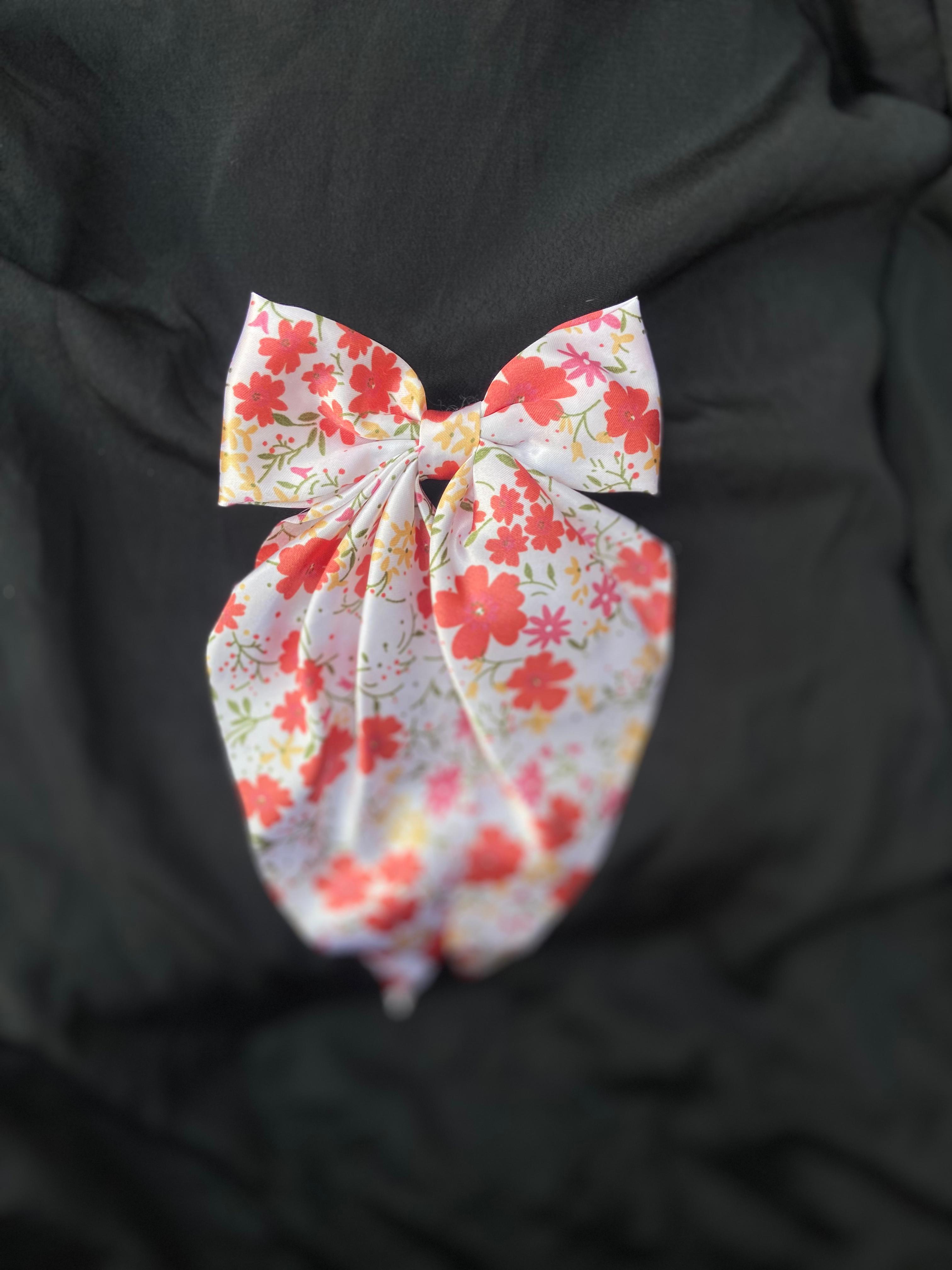 Cherry Blossom floral print satin hair bow clip in white and red."