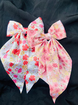Floral fabric bows on a black background