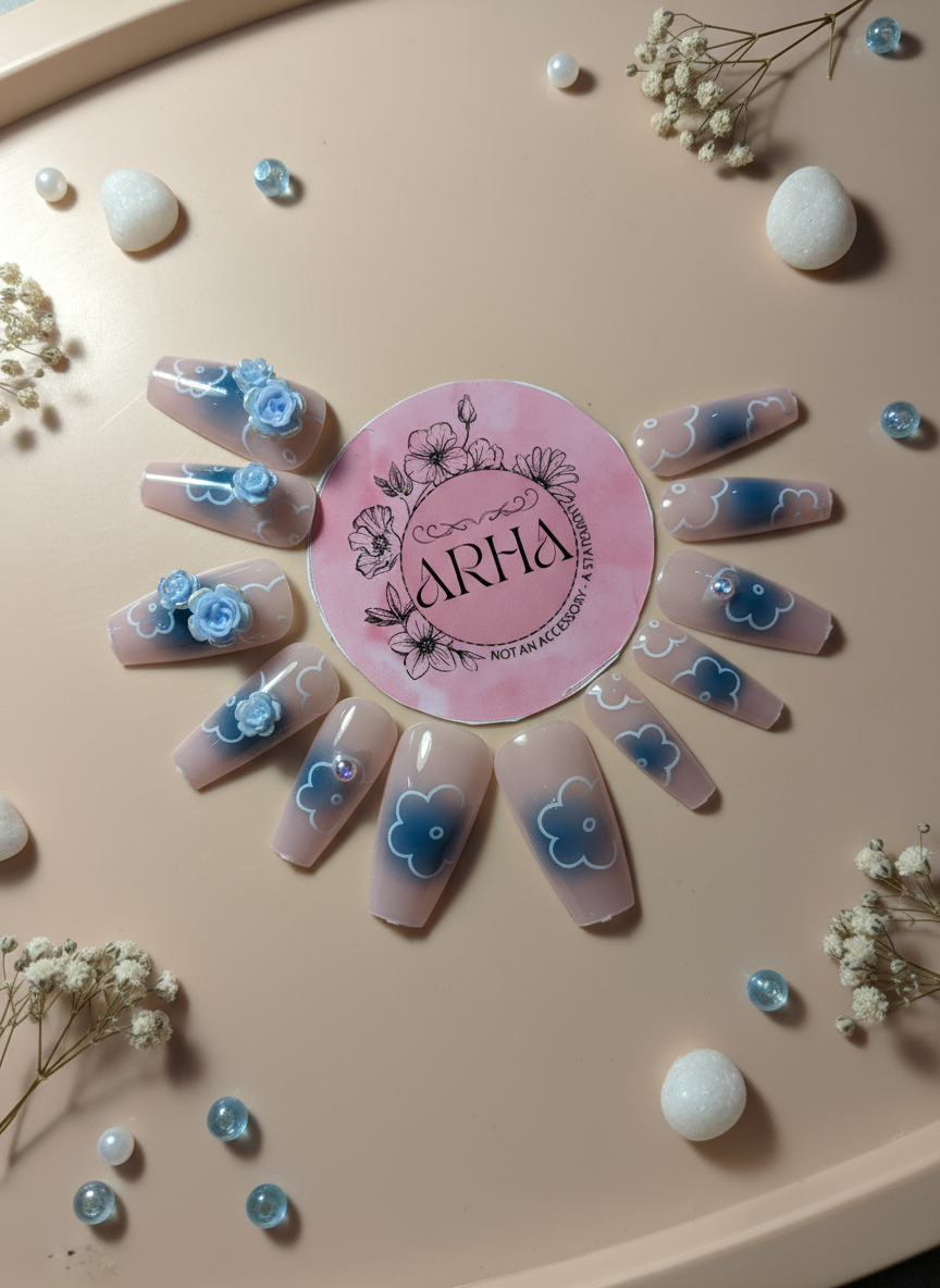 Nail art display with floral designs and 'ARHA' branding on a pink background.
