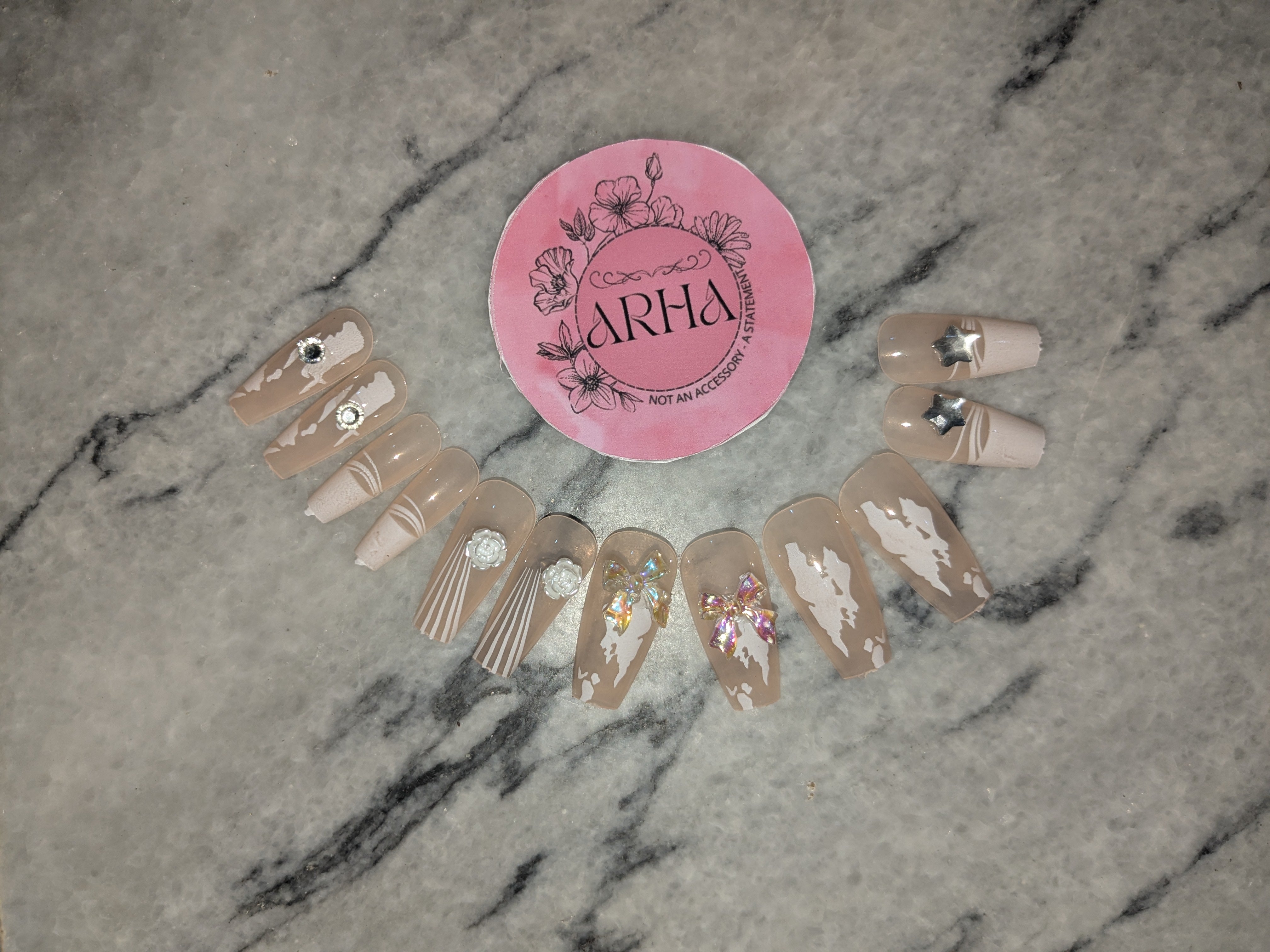 Elegant Nude & White Swirl Press-On Nails with 3D Lavender Flowers, Bows & Bling
