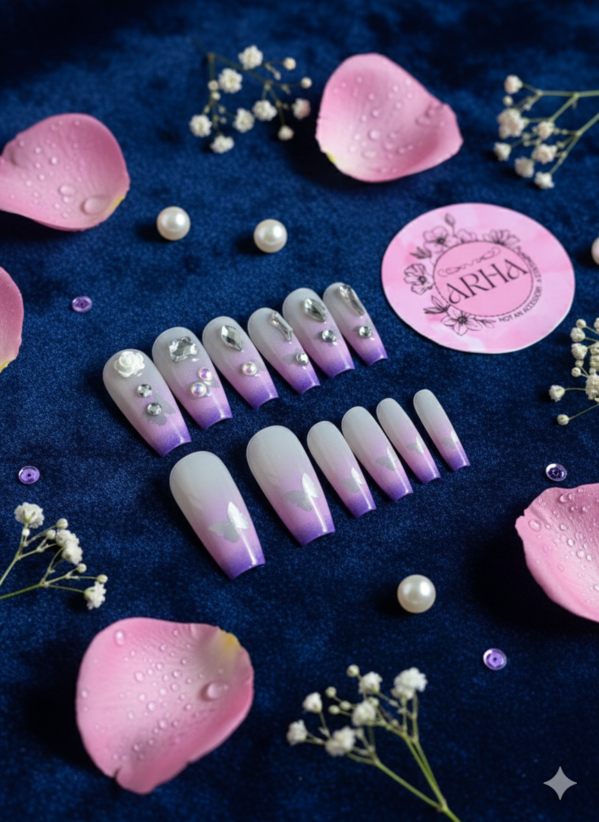 Set of gradient nail art designs with decorative elements on a dark blue background.